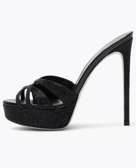 Side profile of a black crystal embellished stiletto platform heel