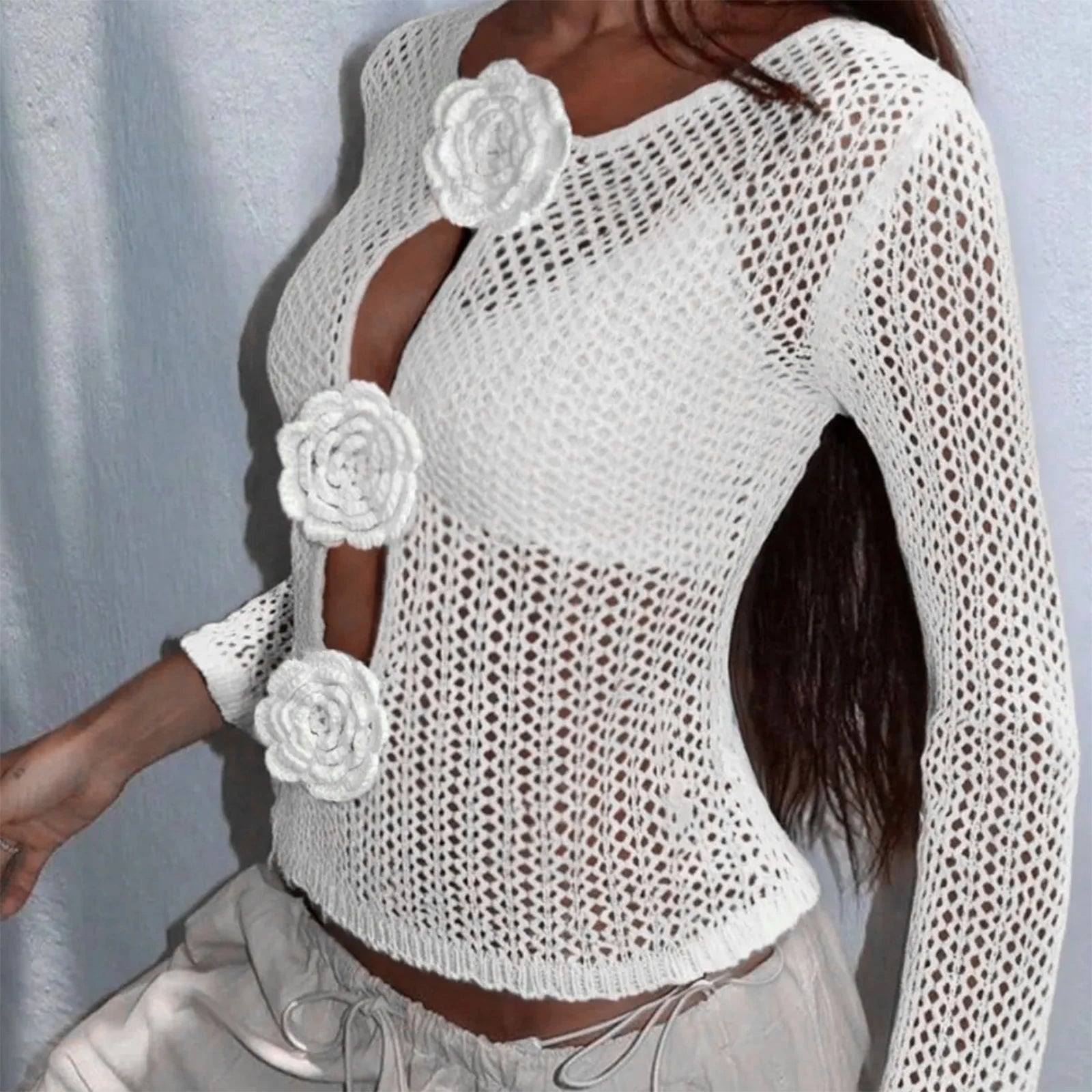 A full-length shot of the 3D flower crochet crop top, styled for a casual day out.