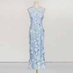 Floral appliqué formal dress for wedding guest look on a mannequin against a white background