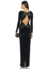 Black velvet gown with open back and crystal embellishments