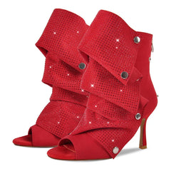 Pair of red stiletto ruched rhinestone peep toe ankle boots, front view.