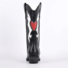 Back view of black embroidered heart western boots
