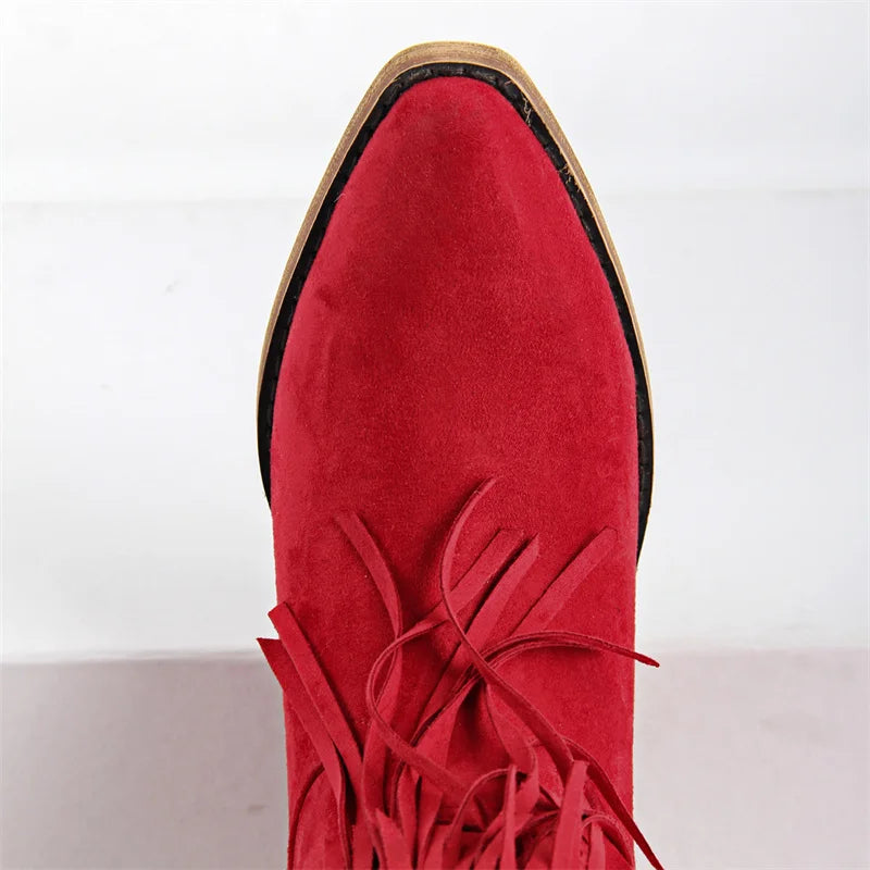 Top view of red fringed pointed toe cowboy boots