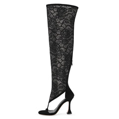 Black lace over the knee stiletto boots with a pointed toe.