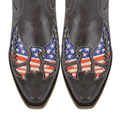 Toe detail of black embroidered wing western boots with flag embroidery