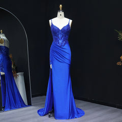 Blue evening gown on a mannequin against a black background
