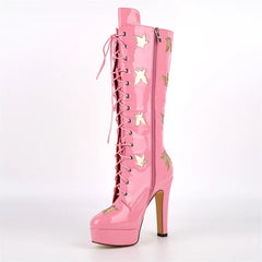 Side view of pink patent leather knee-high lace-up boots with zipper detail