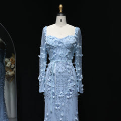 Light blue floral dress on a mannequin against a black background