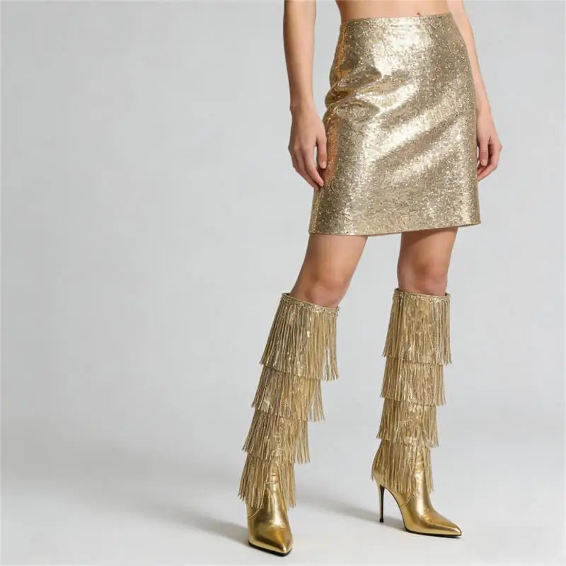 Full leg view of metallic fringe over the knee boots