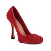 Red high-heeled shoe with a platform sole on a white background