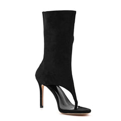 Side view of black cut-out stiletto heel boots