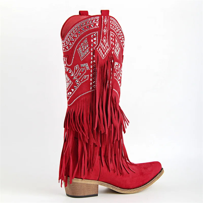 Profile of red fringed pointed toe cowboy boots with embroidery