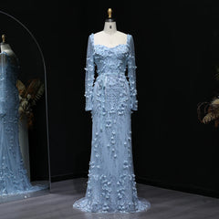 Light blue evening gown on a mannequin against a dark background