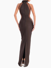 Back view of brown halter evening gown showing fitted waist and sleek sheath silhouette on a white background