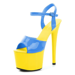 Yellow and blue high-heeled platform shoe on a white background