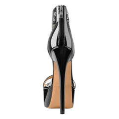 Rear view of black patent chain detail platform stiletto sandals