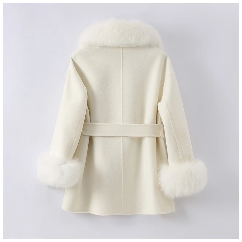 White coat with fur-trimmed cuffs on a light gray background