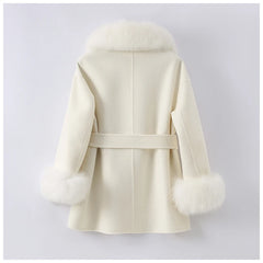 White coat with fur-trimmed cuffs on a light gray background