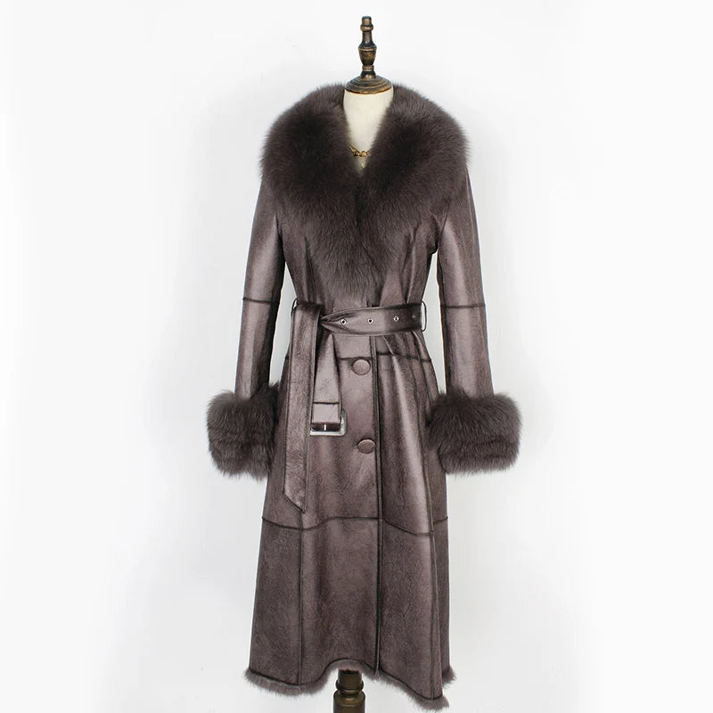 Gray leather coat with fur trim on a mannequin against a white background