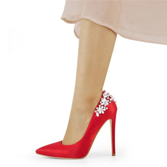 Red satin pointed toe stiletto heel with crystal embellishments on the heel counter.