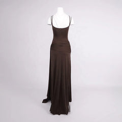Brown evening gown on a mannequin against a white background