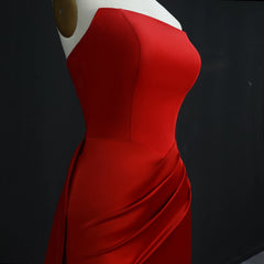 Red evening gown on a black background