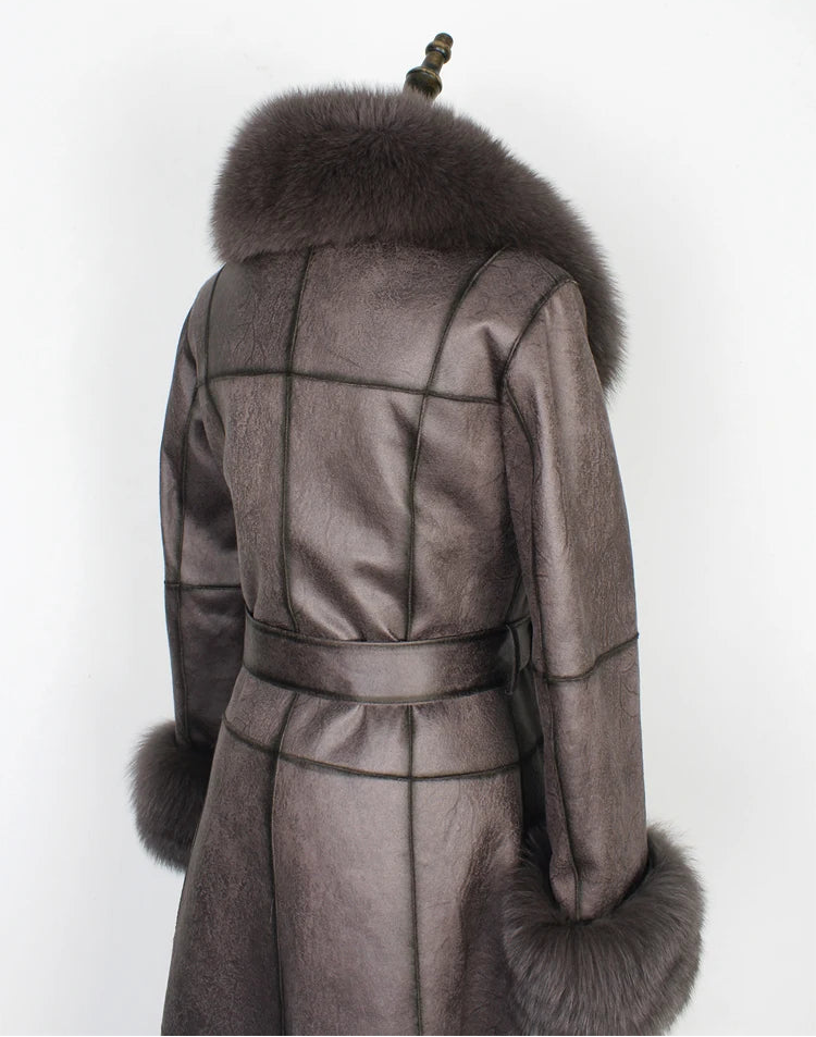 Gray coat with fur trim on a white background