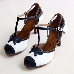 Peep toe T-strap dance heels with black trim and bow
