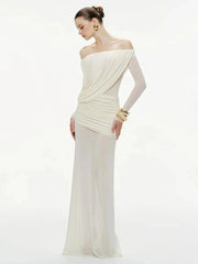 Woman wearing a white off-shoulder gown on a white background
