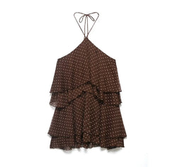 Brown polka dot dress with tiered layers on a white background
