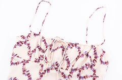Close-up of square neck tie-front detail on A-line dress