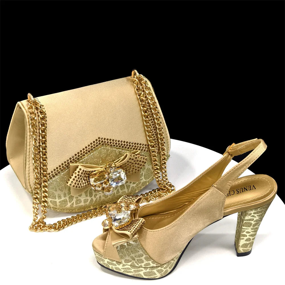 Beige high-heeled shoes and handbag set with decorative elements on a white surface.