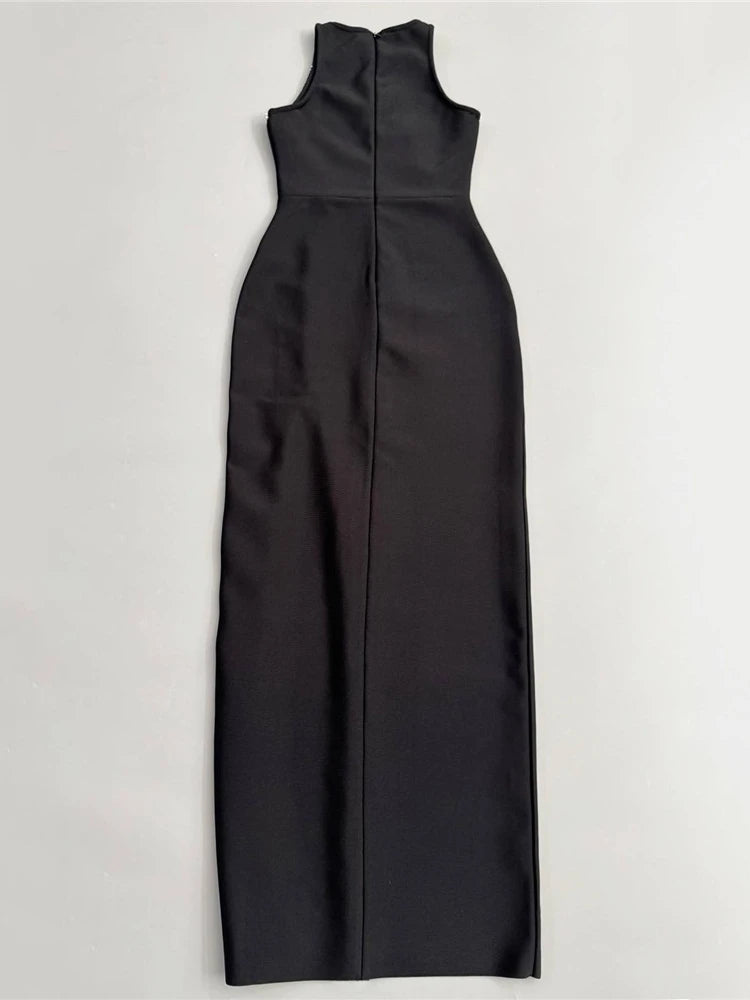 Black sleeveless dress on a light gray background