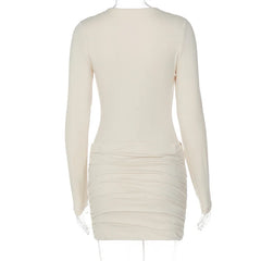 Beige long-sleeve dress on a white background