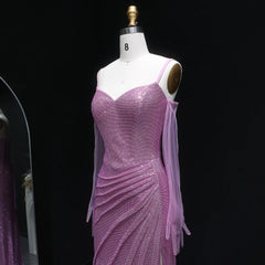 Purple sequin dress on a mannequin against a black background