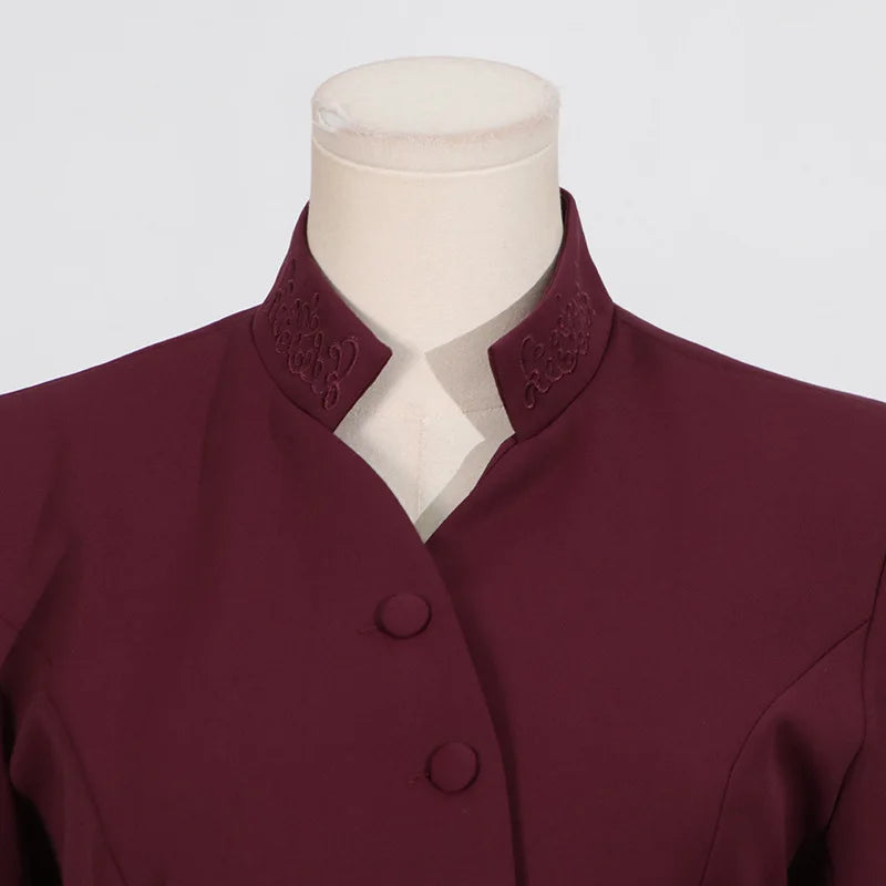 Maroon jacket on a mannequin with a white background