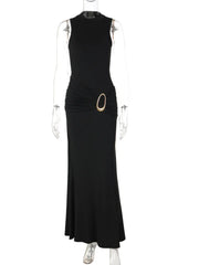 Black dress with a gold belt on a mannequin against a white background