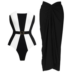 Black and white paneled swimsuit next to a black draped maxi skirt