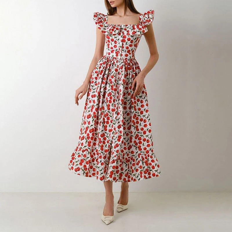 Woman wearing a red floral dress on a white background