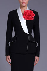 Peplum blazer with contrast lapel and red flower brooch