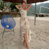 One-shoulder swimsuit and ruffled skirt set with abstract print