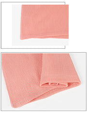 Pink ribbed fabric on a white background