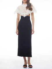 Sheath dress with a white lace cape overlay, showing shoes.