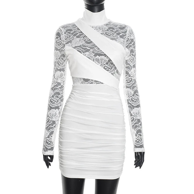 White lace dress on a mannequin against a white background