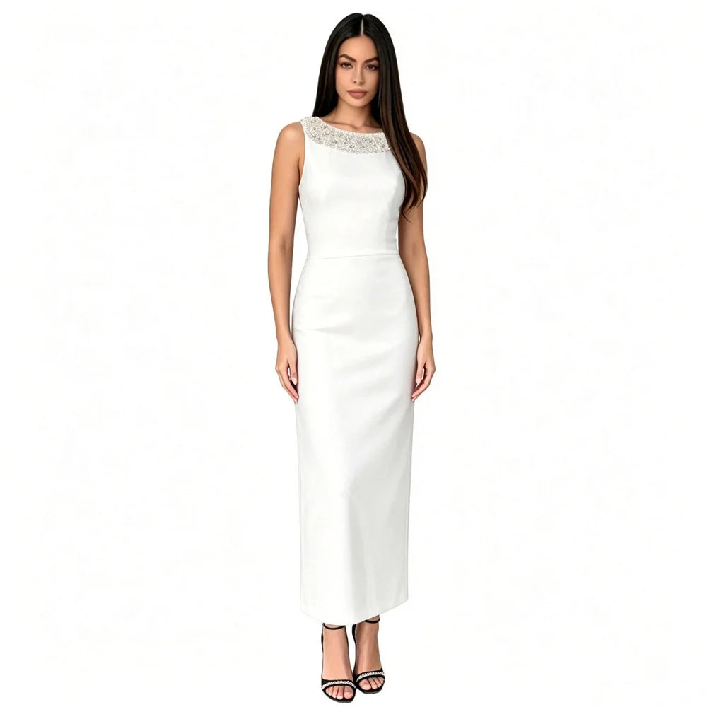 White sleeveless maxi dress with embellished neckline