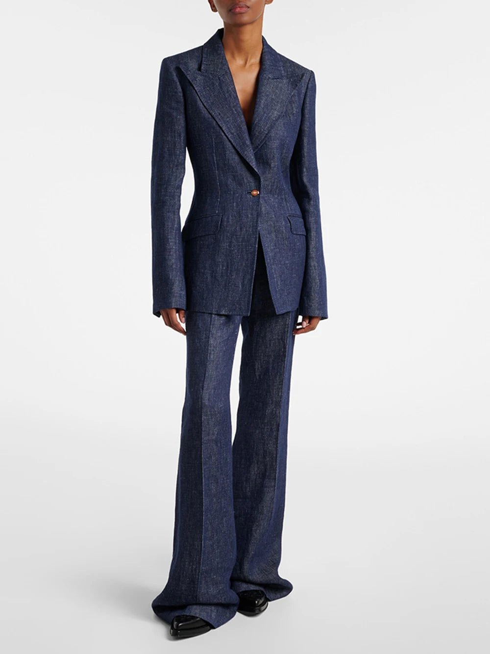 Notched lapel single button blazer with flare leg trousers on model