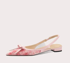 Pink floral sandal on a white background
