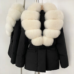 Black winter coat with white fur collar on a mannequin against a white background