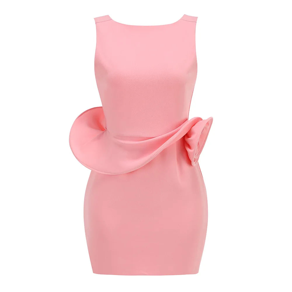 Pink dress with a large bow on a white background