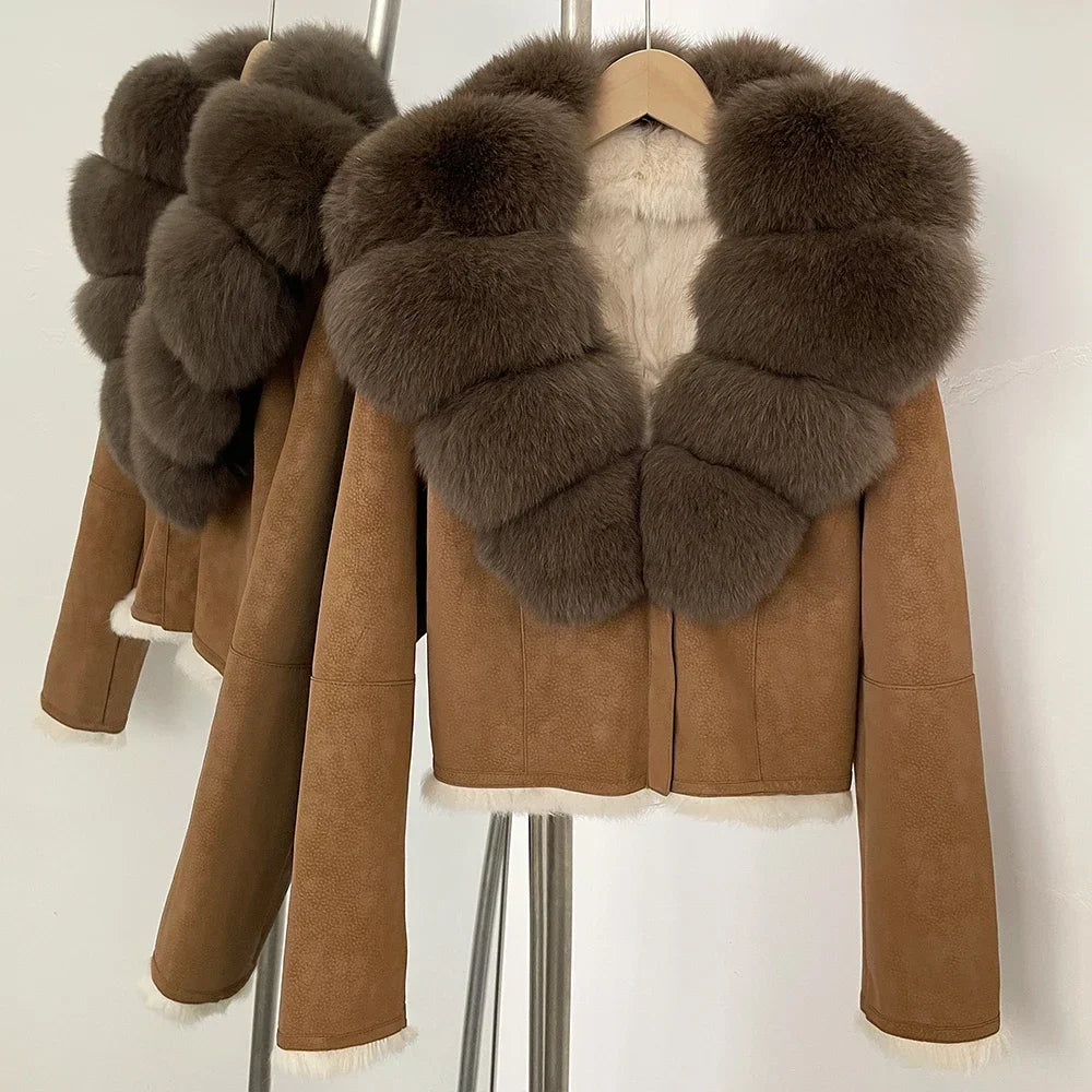 Brown suede jacket with fur trim on a mannequin against a white background